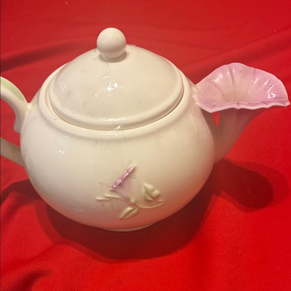 Elegant White Teapot with Pink Floral Accent